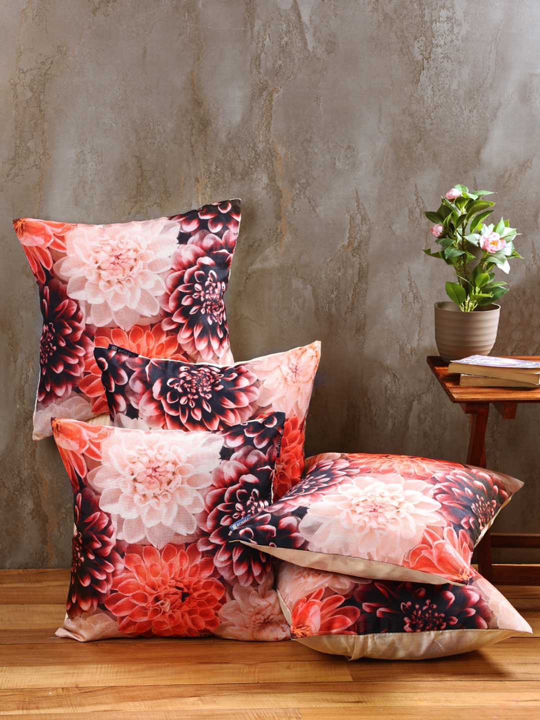 

Myntra Elegant Homes Multicoloured 5 Pcs Floral Printed Jute Cotton Square Cushion Covers, Multi