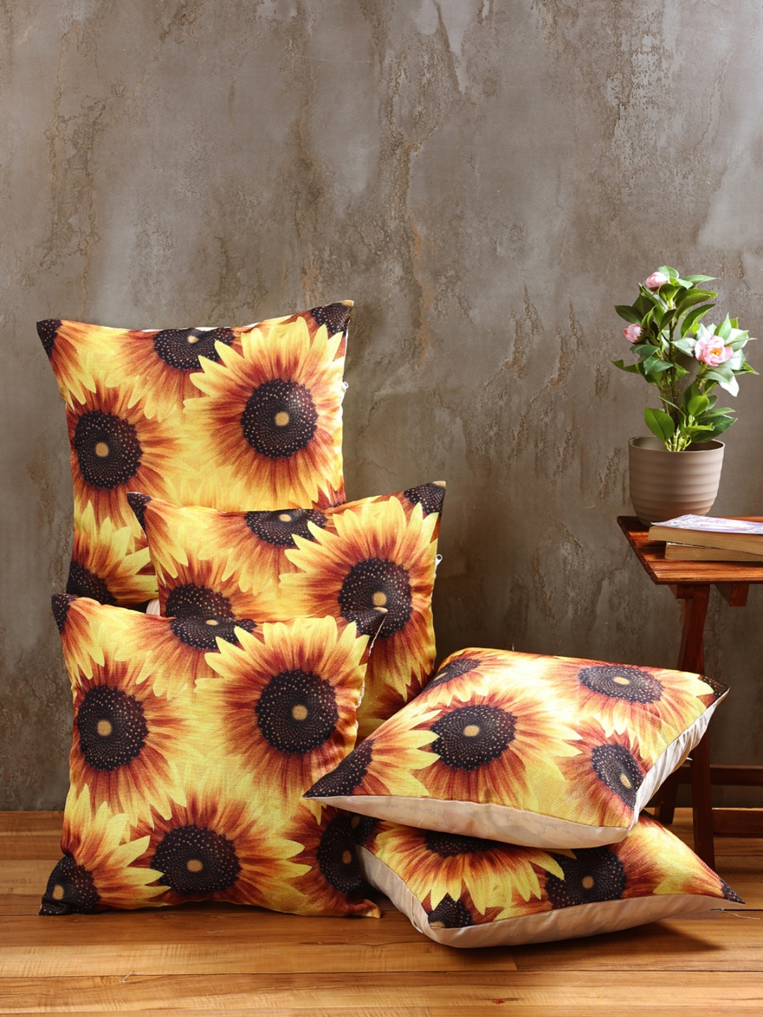 

Myntra Elegant Homes Brown & Yellow 5 Pieces Floral Printed Square Cushion Covers