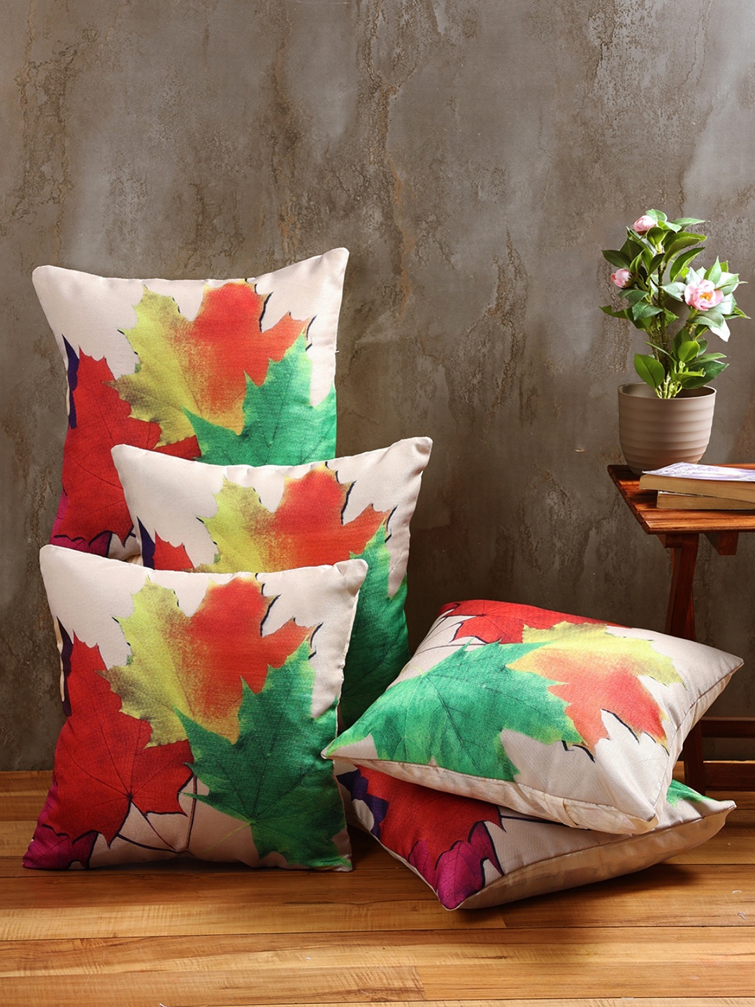 

Myntra Elegant Homes Green & Red 5 Pieces Floral Printed Square Cushion Covers