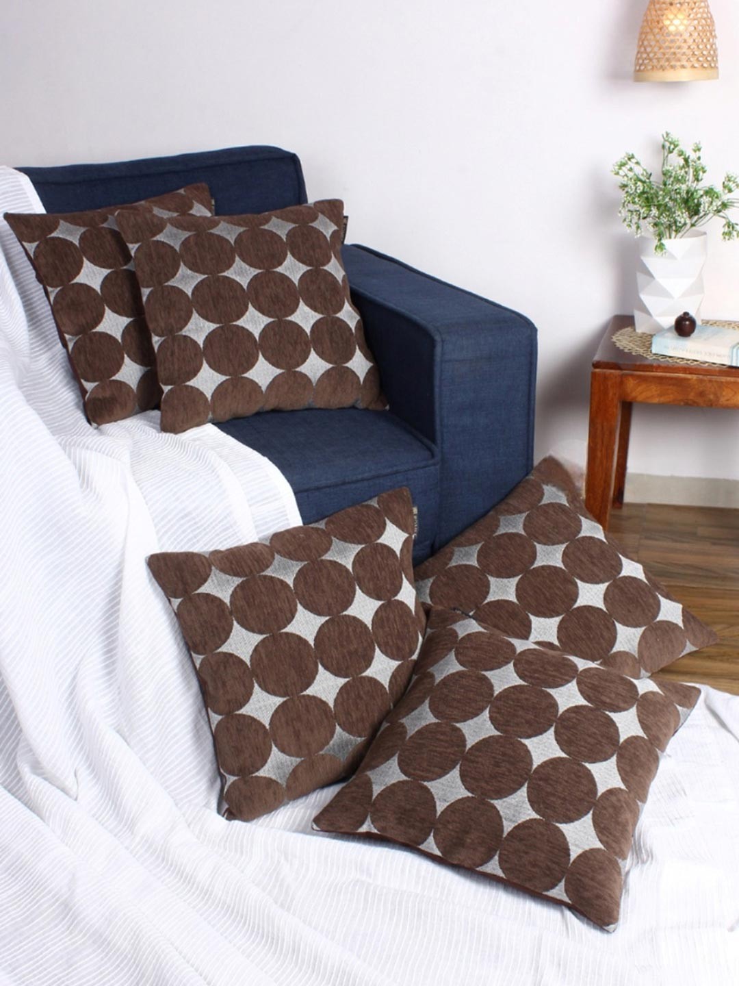 

Myntra Elegant Homes Brown & Grey 5 Pieces Geometric Printed Velvet Square Cushion Covers