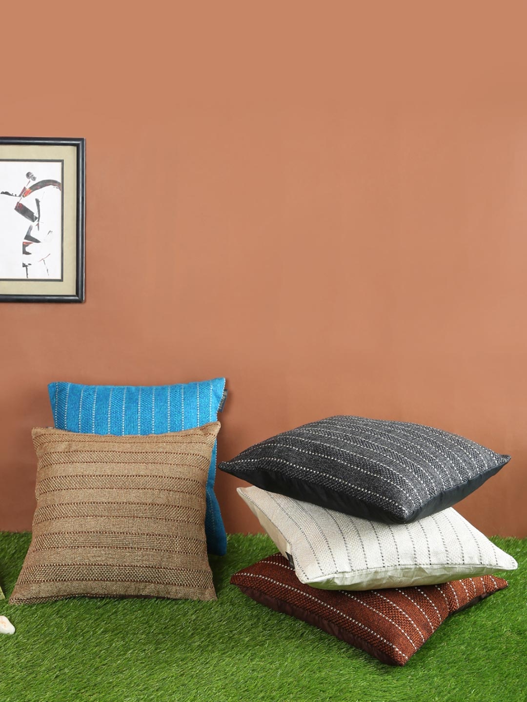 

Myntra Elegant Homes Blue & Brown 5 Pieces Striped Square Cushion Covers