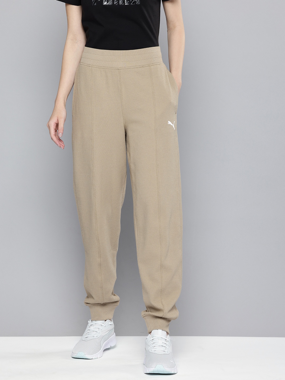 

Puma Women HER Self Design Relaxed Fit High Waist Outdoor Joggers, Beige