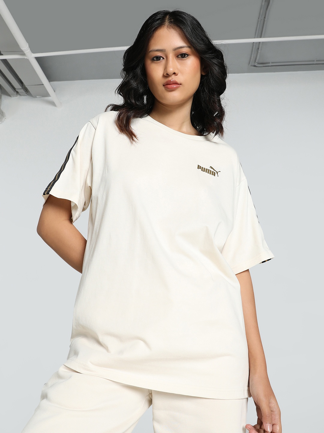 

Puma Tape Minimal Gold Relaxed Fit Outdoor T-shirt, White