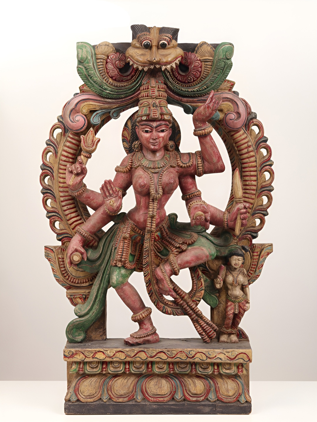 

Exotic India Rust & Green Devi Parvati Wooden Religious Idol Showpiece