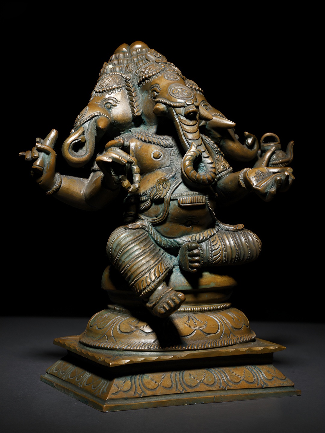 

Exotic India Brown Bronze Three Headed Sitting Lord Ganesha Religious Idol Showpiece