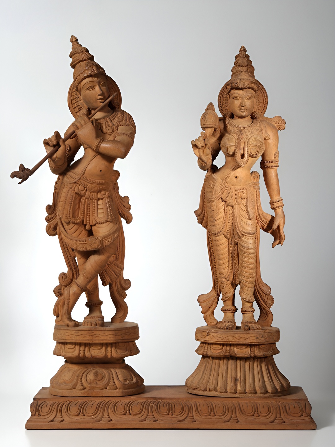 

Exotic India Brown Wooden Radha Krishna Religious Idol Showpiece