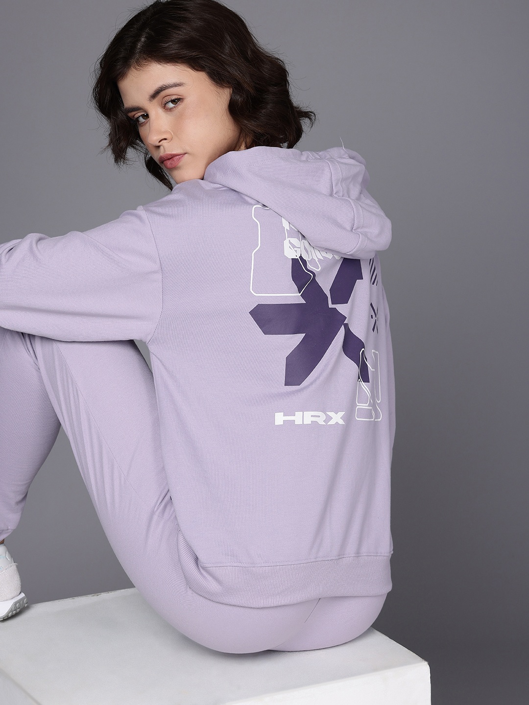 

HRX by Hrithik Roshan Brand Logo Printed Hooded Tracksuits, Lavender