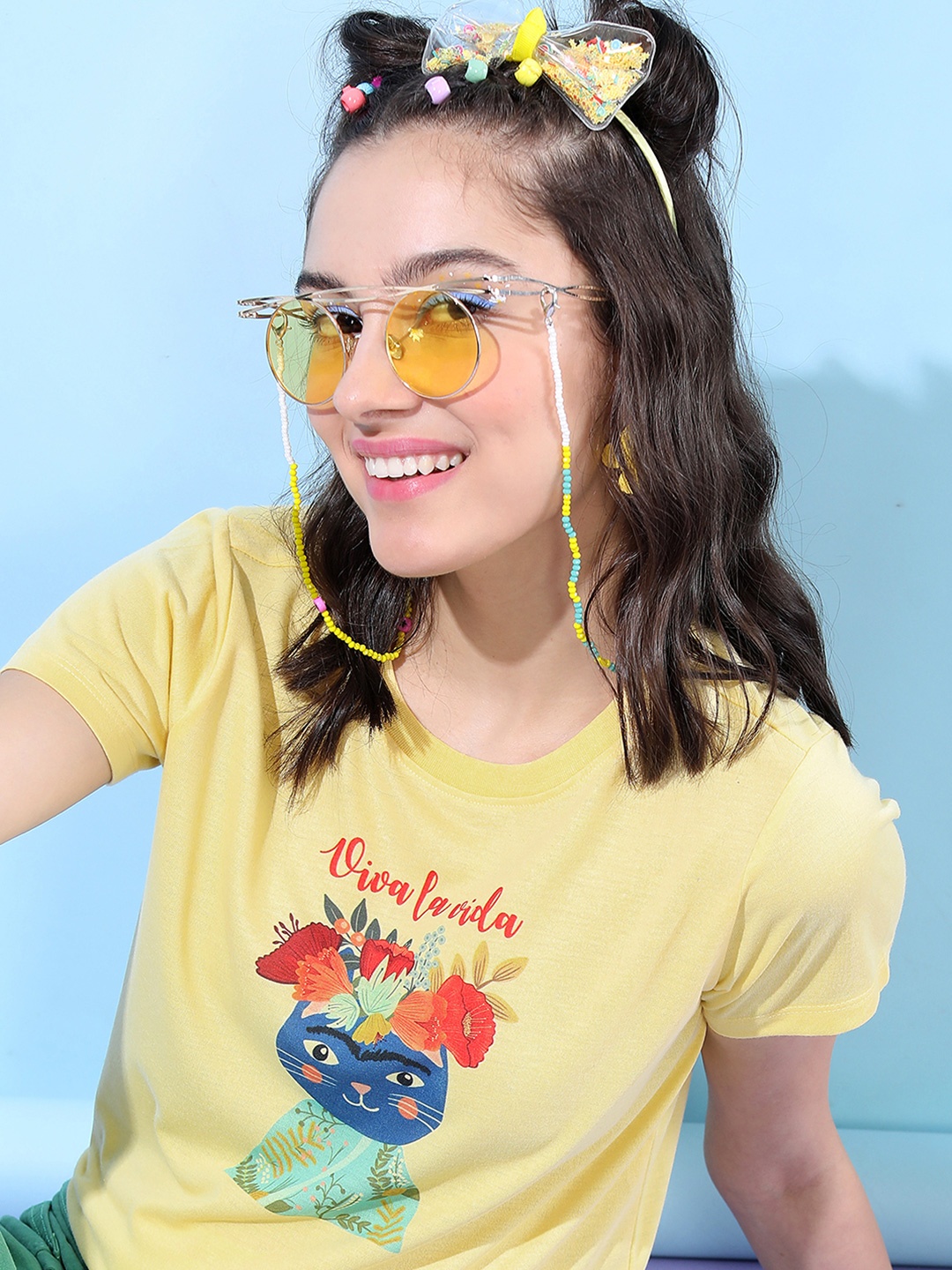 

Tokyo Talkies Women Printed Slim Fit T-shirt, Yellow