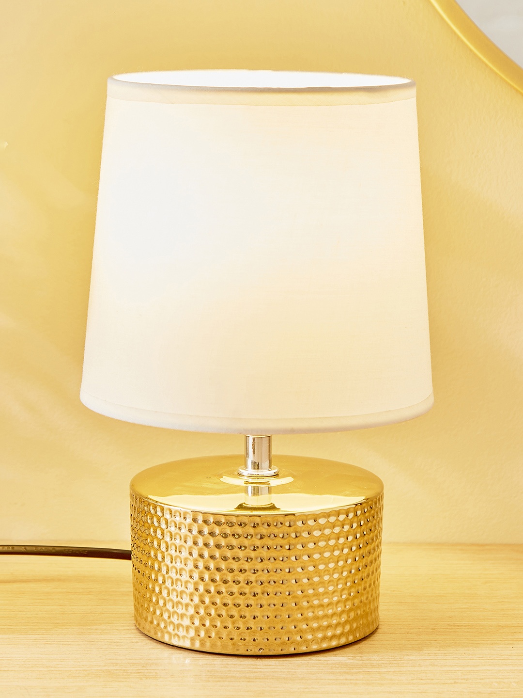 

Home Centre Glint Regal Gold-Toned Ceramic Contemporary Frustum Shaped Table Lamp