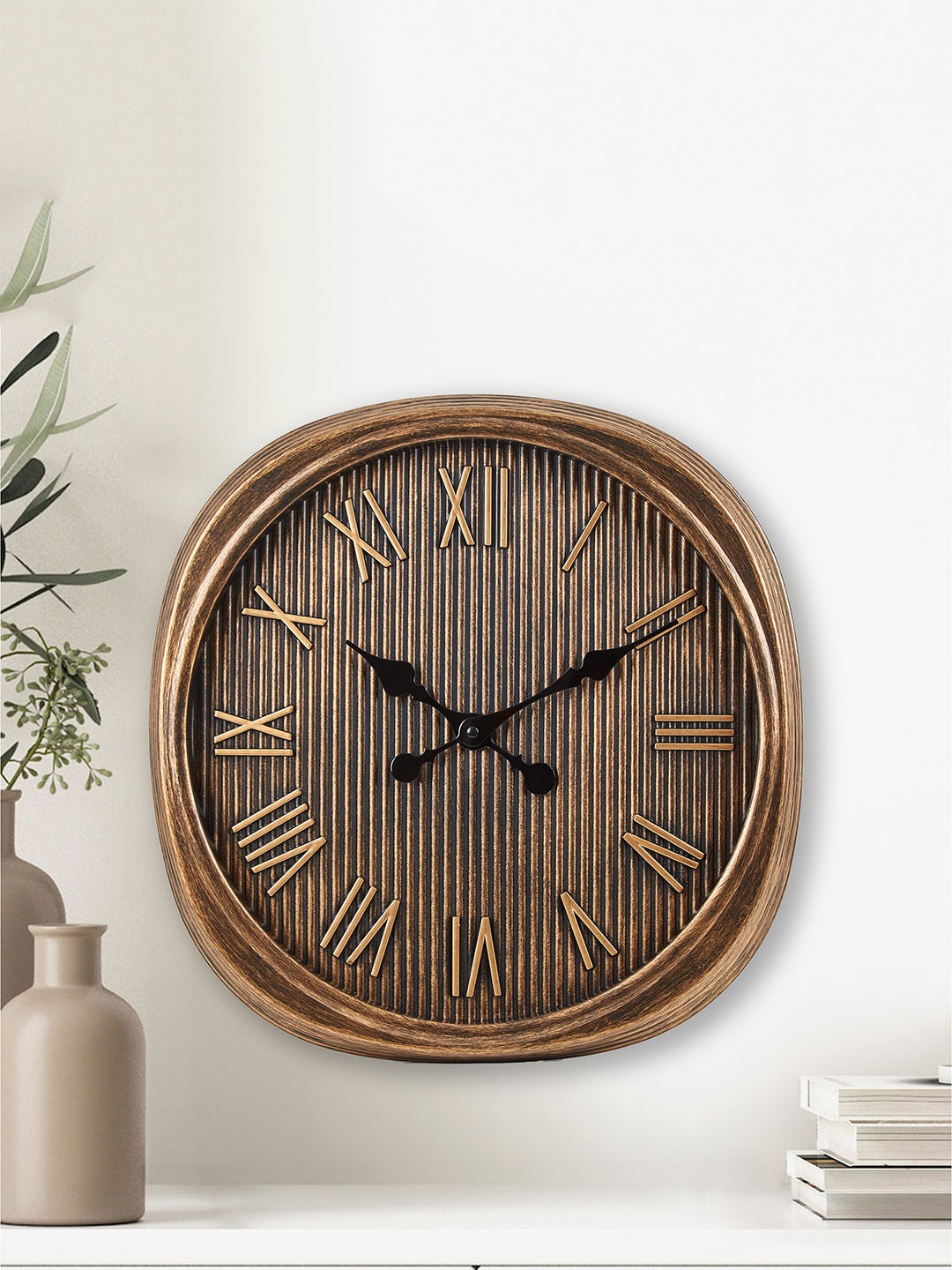 

Home Centre Corsica Fortune Bronze-Toned Textured Round Contemporary Analogue Wall Clock