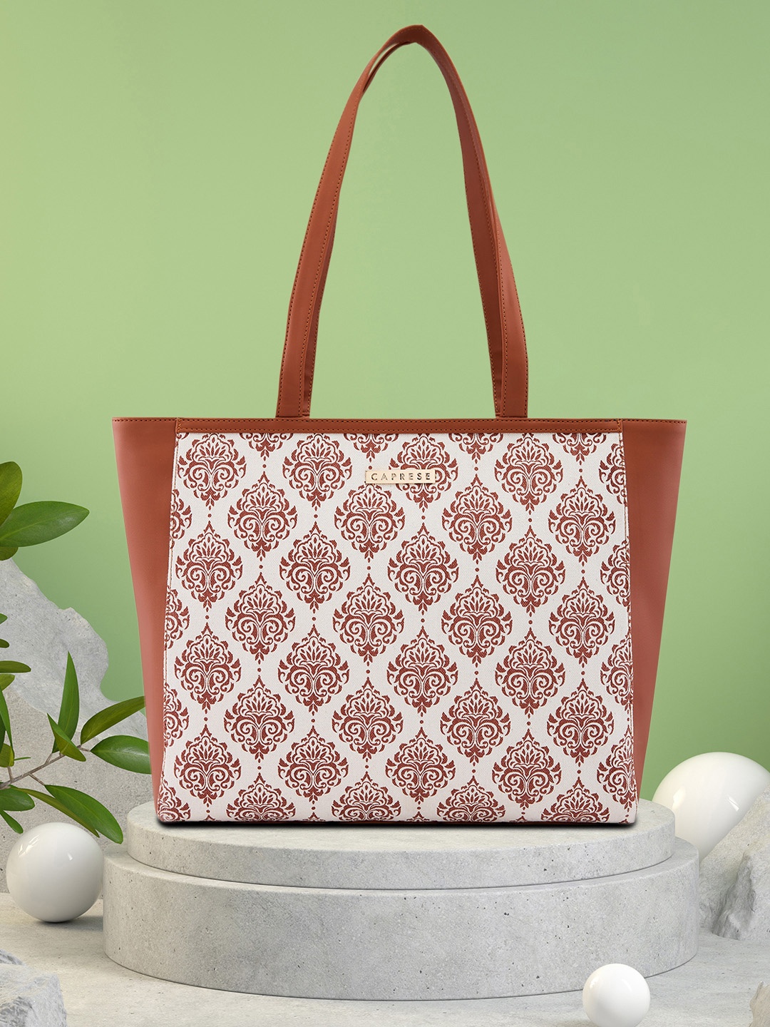 

Caprese Hanna Ethnic Motifs Printed Structured Shoulder Bag, Tan