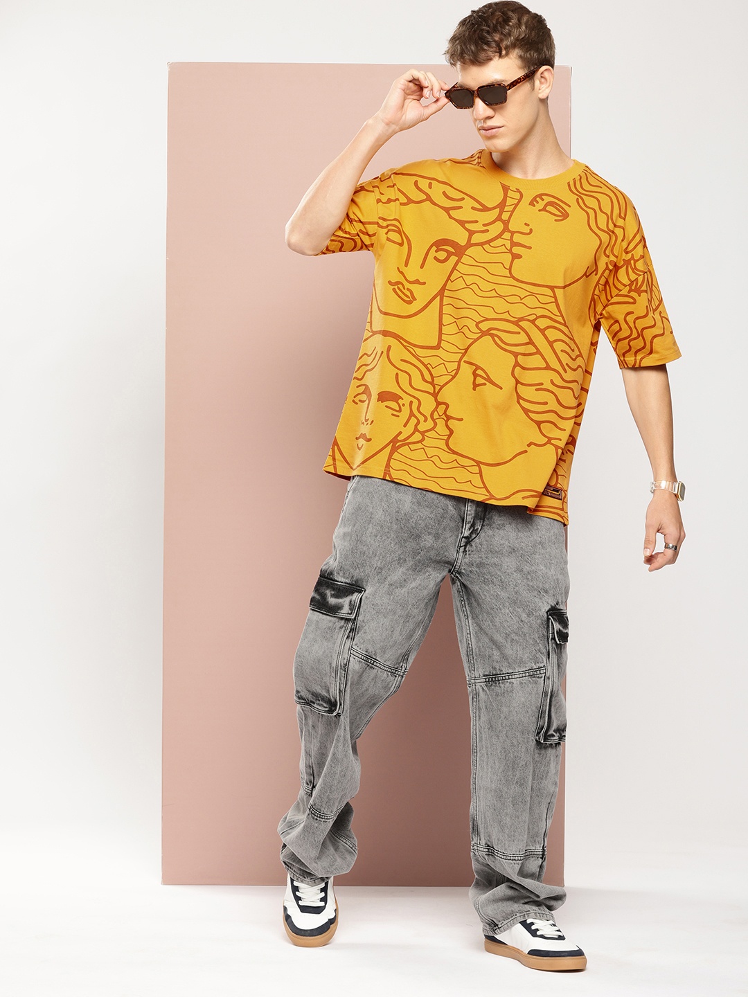 

Stormborn Men Printed Drop-Shoulder Sleeves Oversized Pure Cotton T-shirt, Mustard