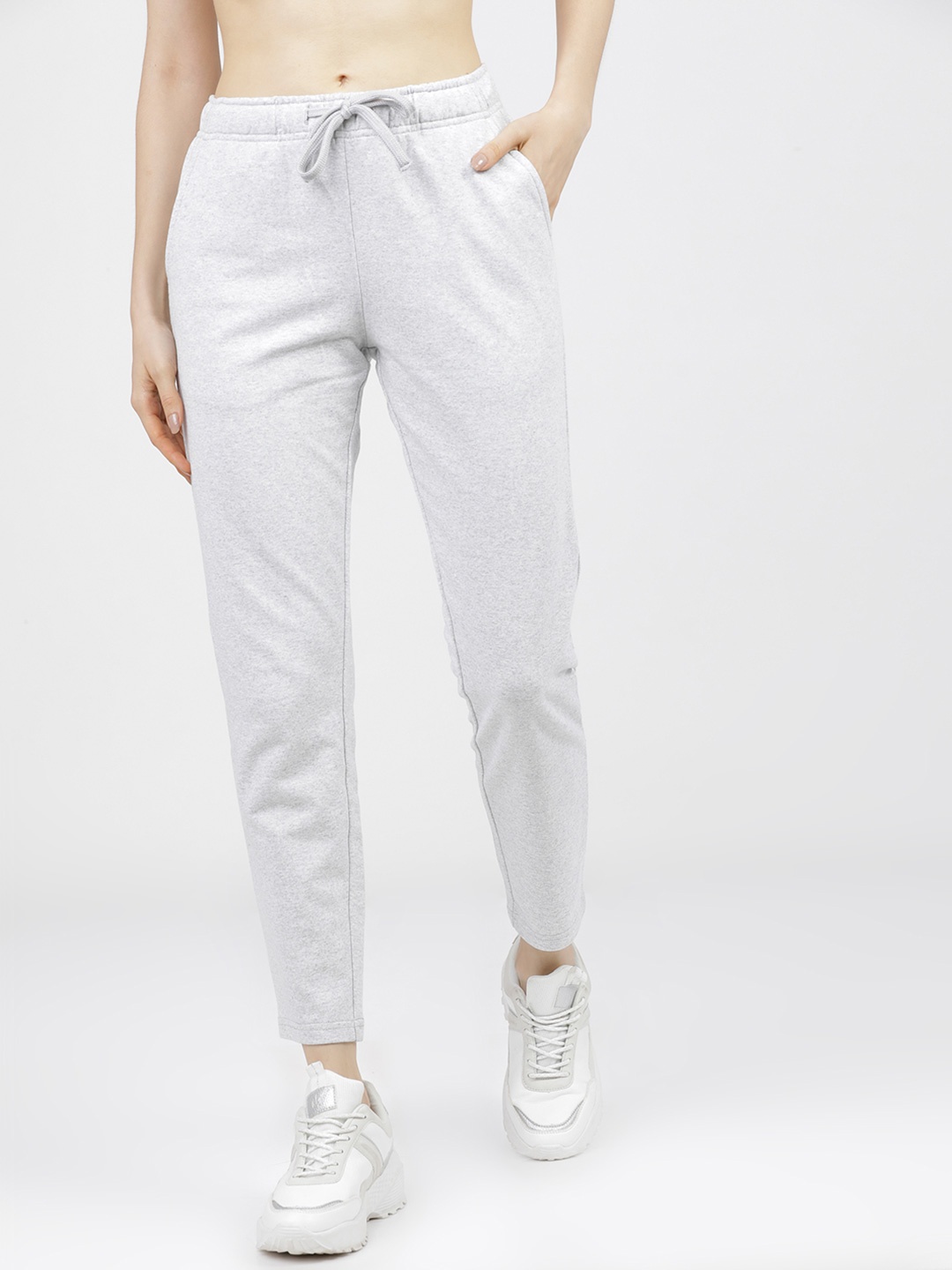 

Tokyo Talkies Women Solid Mid-Rise Slim Fit Track Pants, White