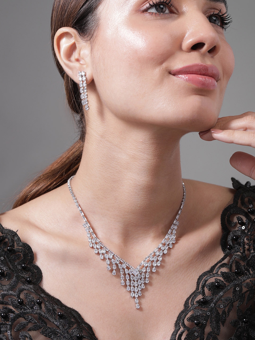 

Rubans Rhodium Plated Cubic Zirconia Studded Waterfall Necklace and Earrings Set, Silver