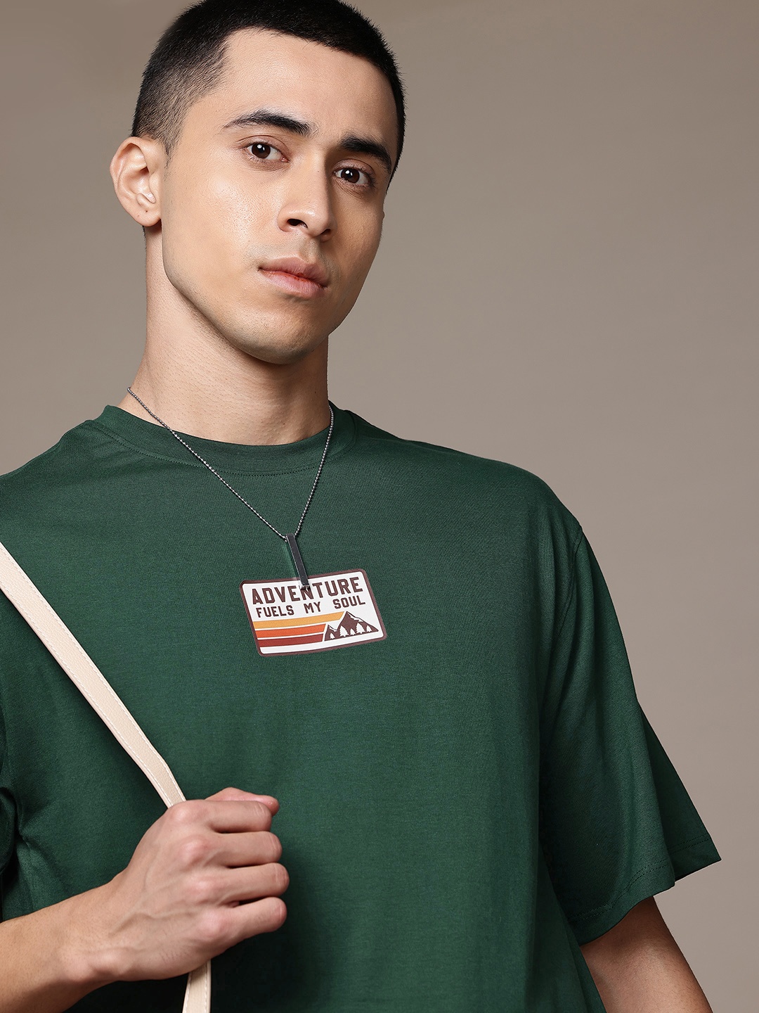 

The Roadster Lifestyle Co. Men Pure Cotton Relaxed Fit T-shirt, Green