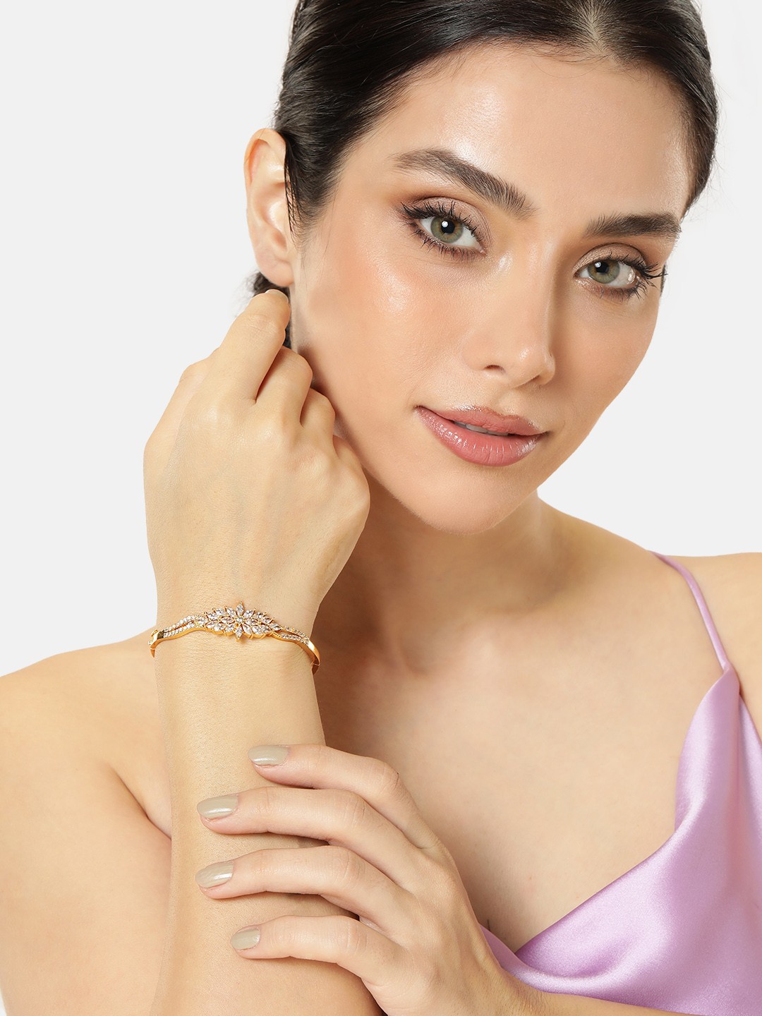 

Manikya Women Brass Cubic Zirconia Gold-Plated Bangle-Style Bracelet
