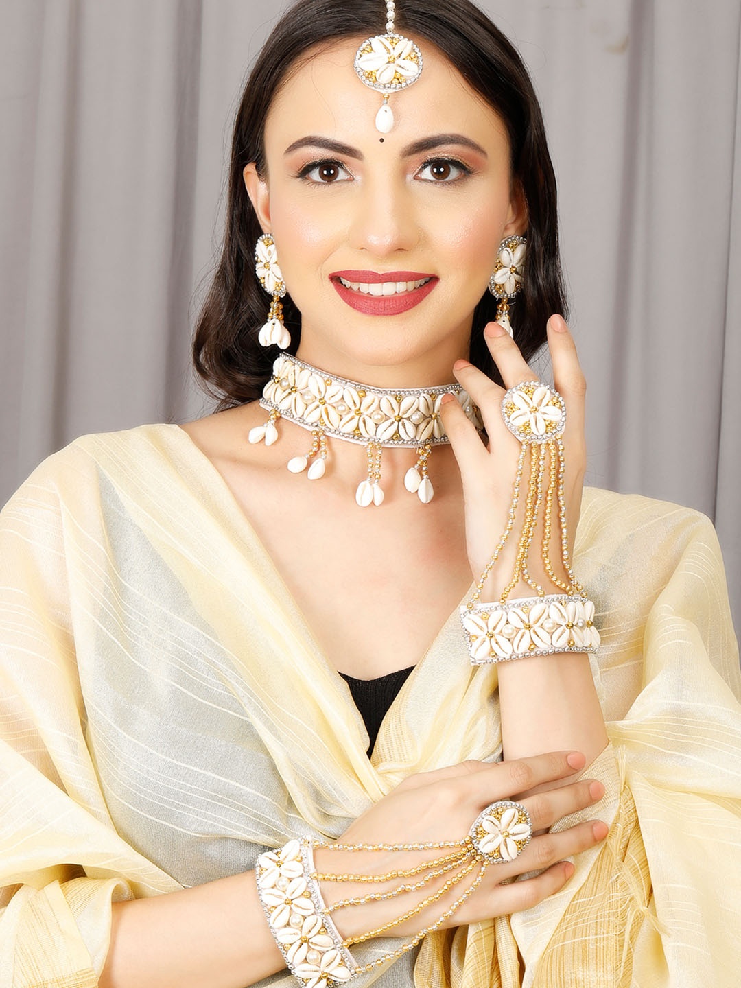 

VIVAZS Sea Shell Jewellery Set With Maang Tikka & Hathphool, White