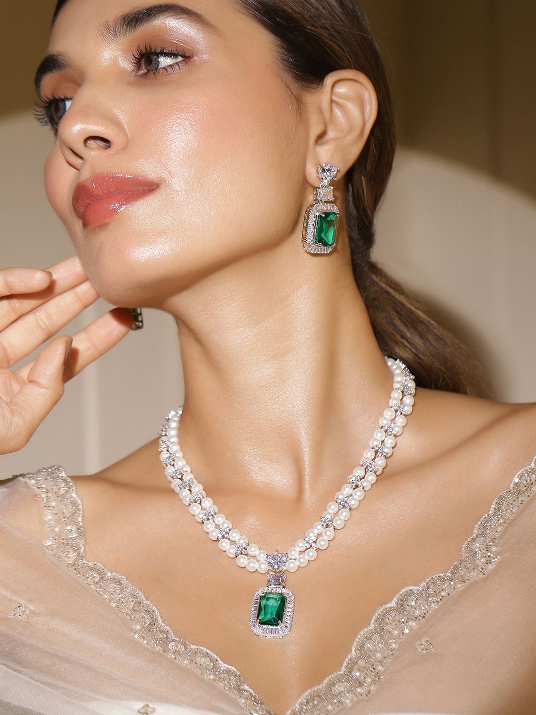 

Rubans Rhodium Plated Pearl Necklace Set with Emerald & Cubic Zirconia Pendant & Earrings, Silver