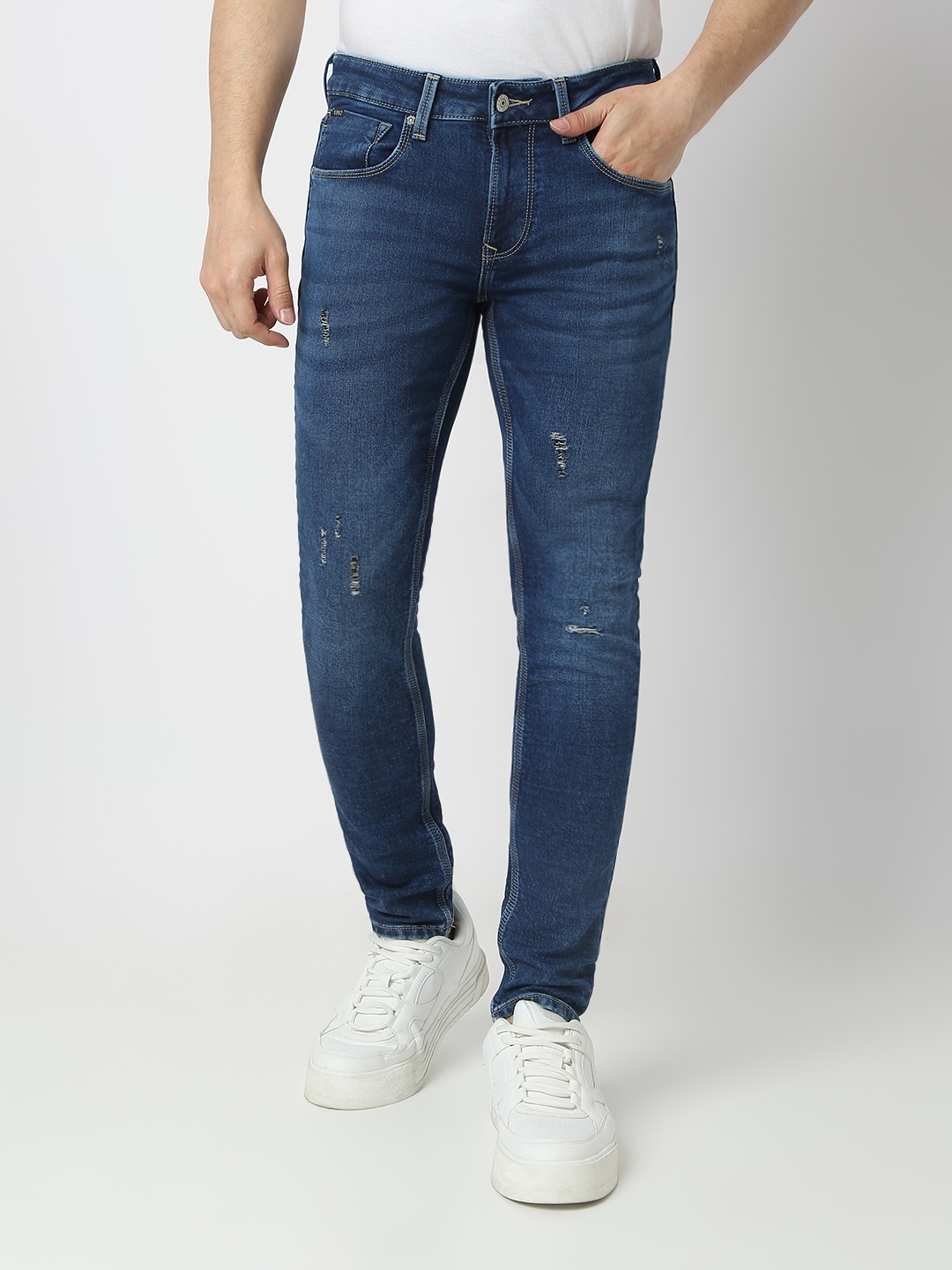 

SPYKAR Men Super Skinny Fit Low-Rise Mildly Distressed Light Fade Stretchable Jeans, Blue