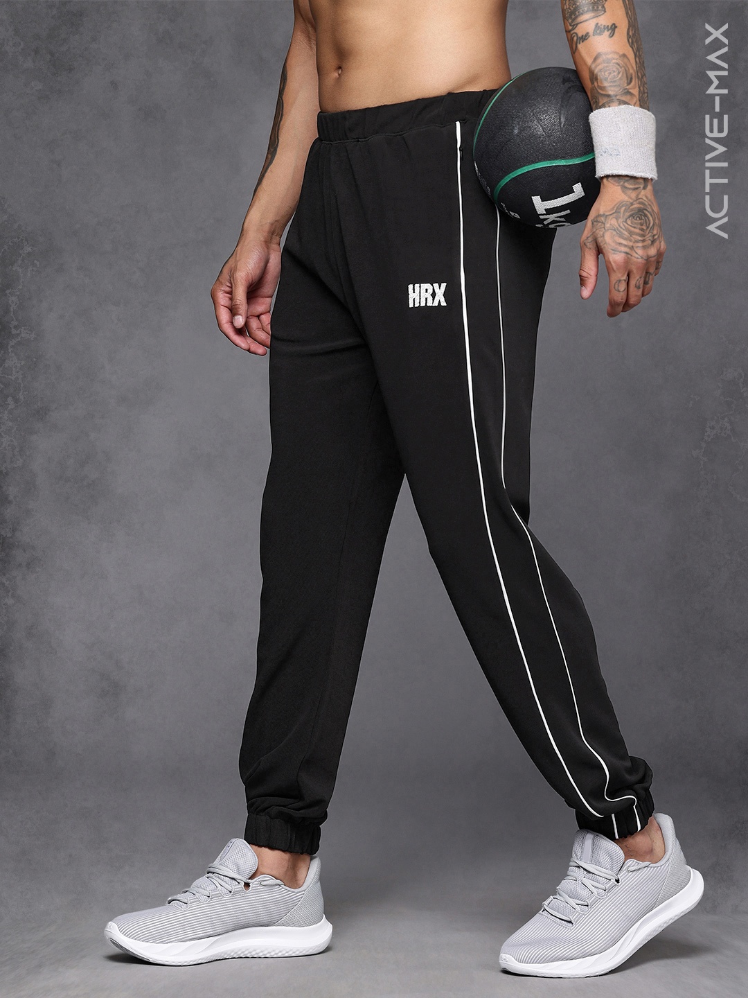

HRX by Hrithik Roshan Stiped Rapid-Dry Running Track Pants, Black