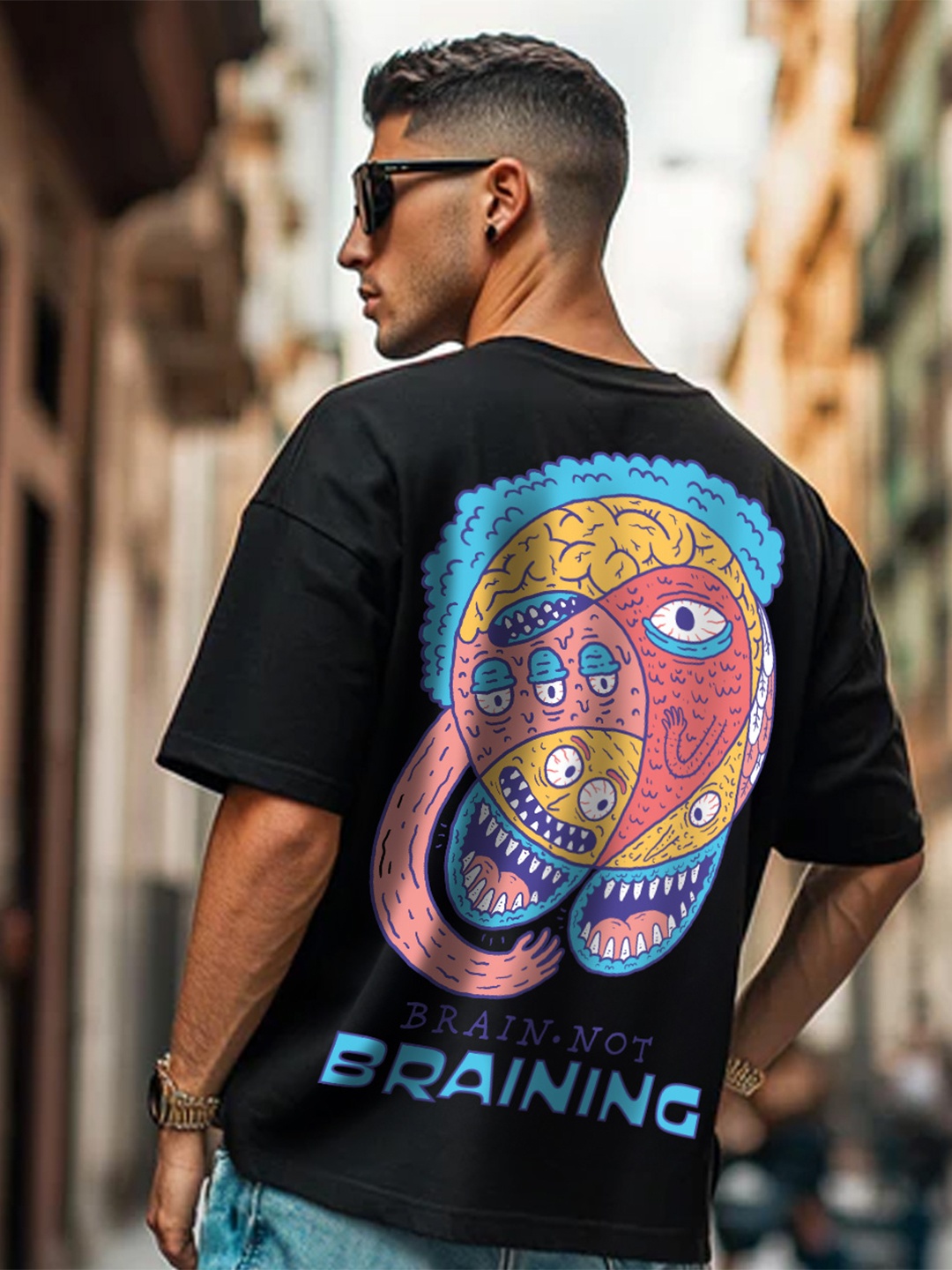 

VEIRDO Men Graphic Printed Round Neck Pure Cotton Oversized T-shirt, Black