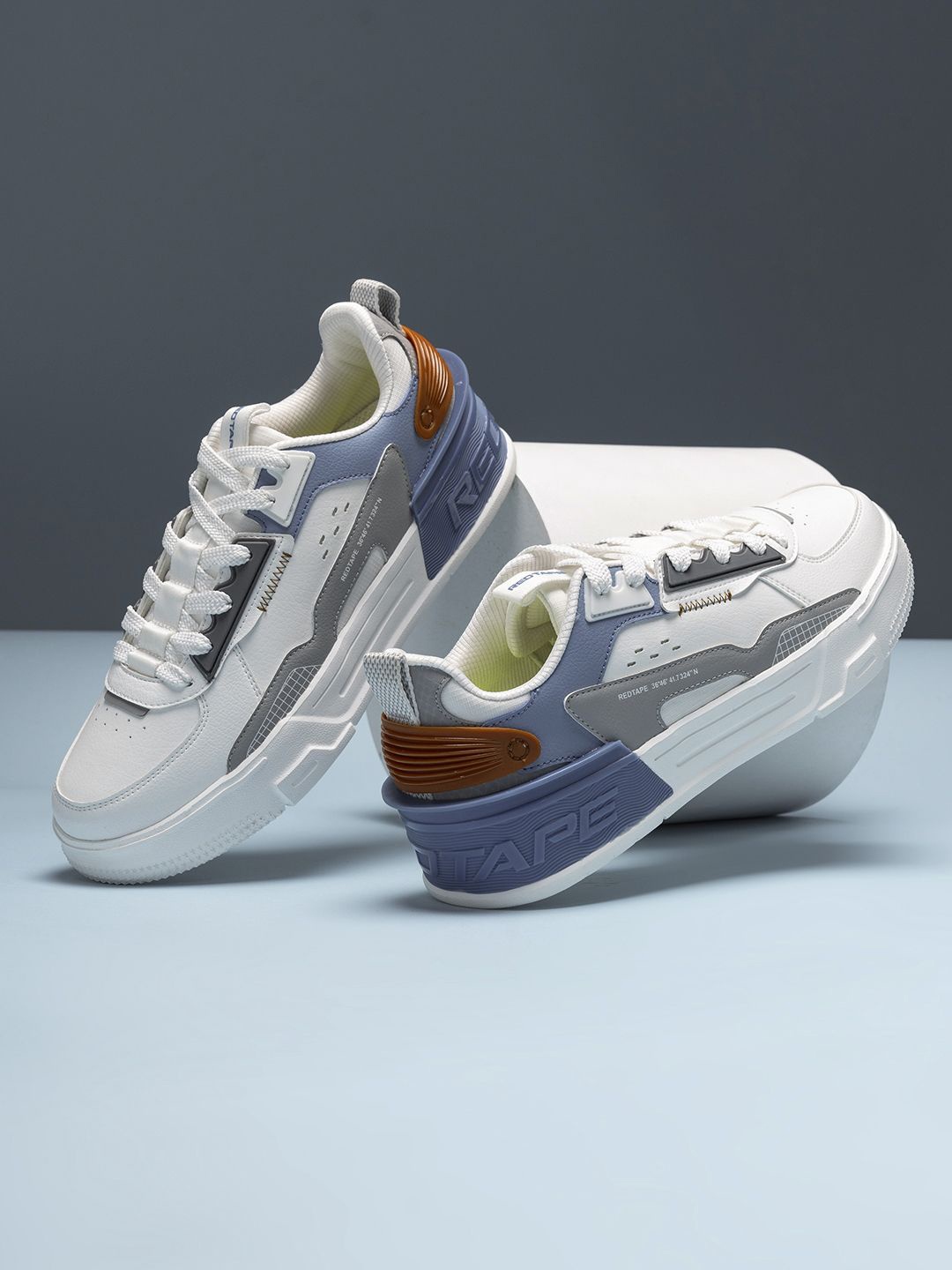 

Red Tape Men Colourblocked Sneakers, White