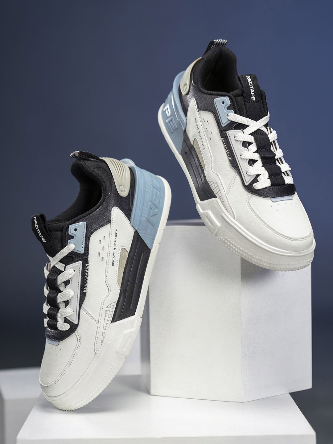 

Red Tape Men Colourblocked Sneakers, White