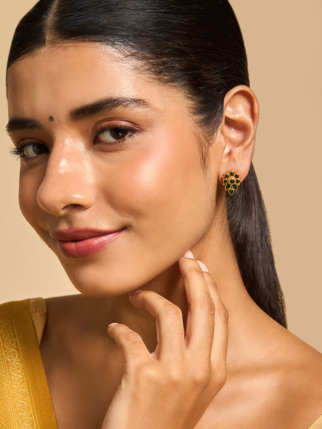 

Kushal's Fashion Jewellery Artificial Stones Gold-Plated Leaf Shaped Studs, Red