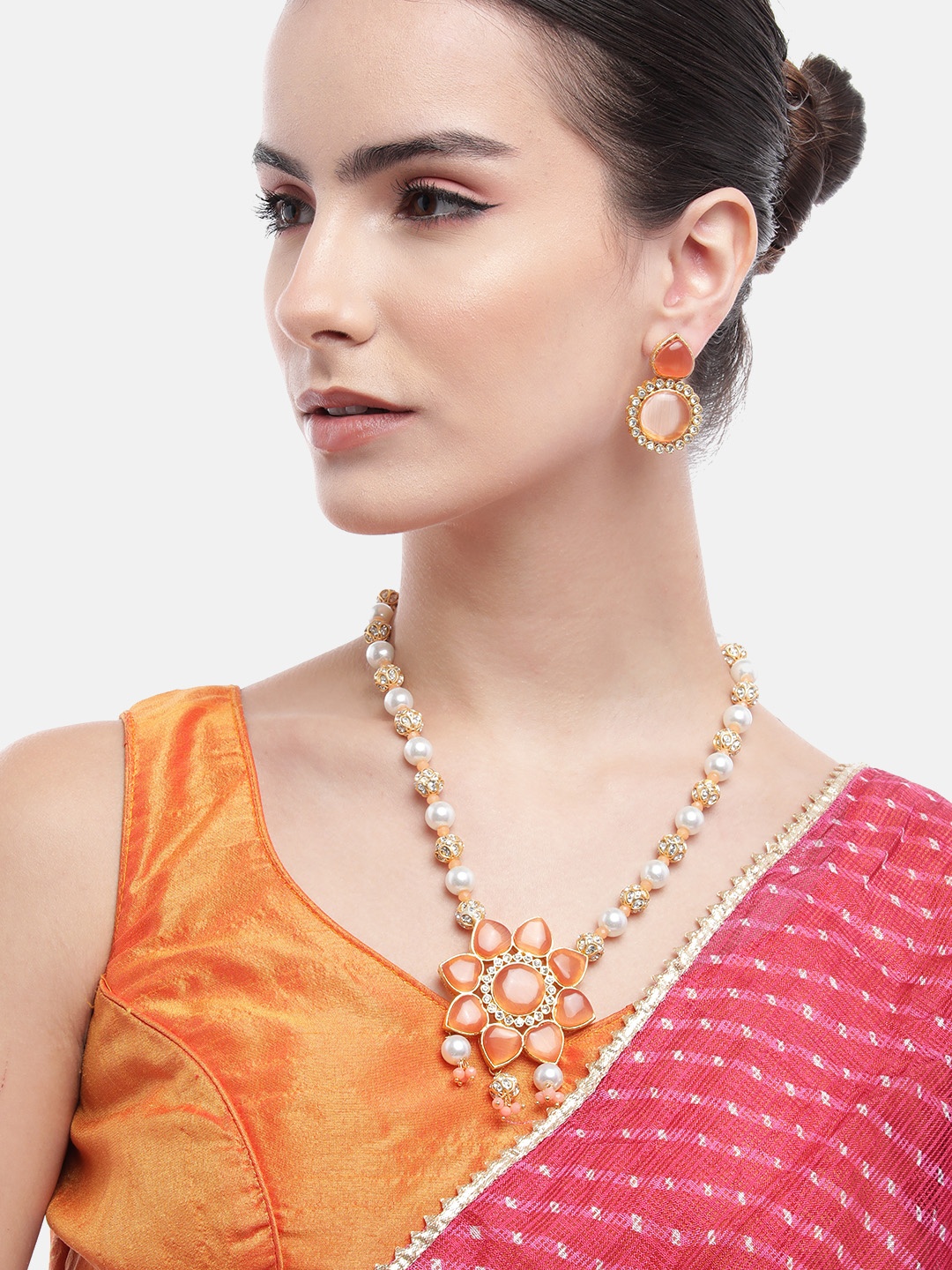 

Anouk Gold-Plated Kundan & AD Studded Peach Floral Princes Necklace with Earrings