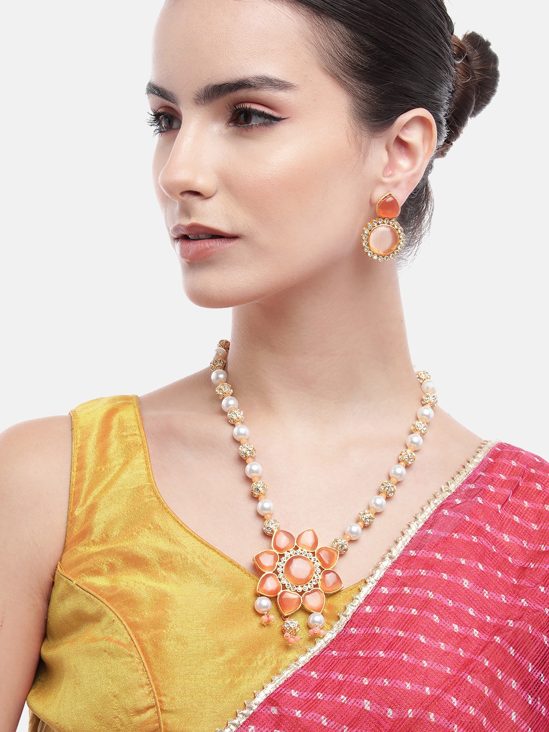 

Anouk Gold-Plated Kundan & AD Studded Peach Floral Princes Necklace with Earrings