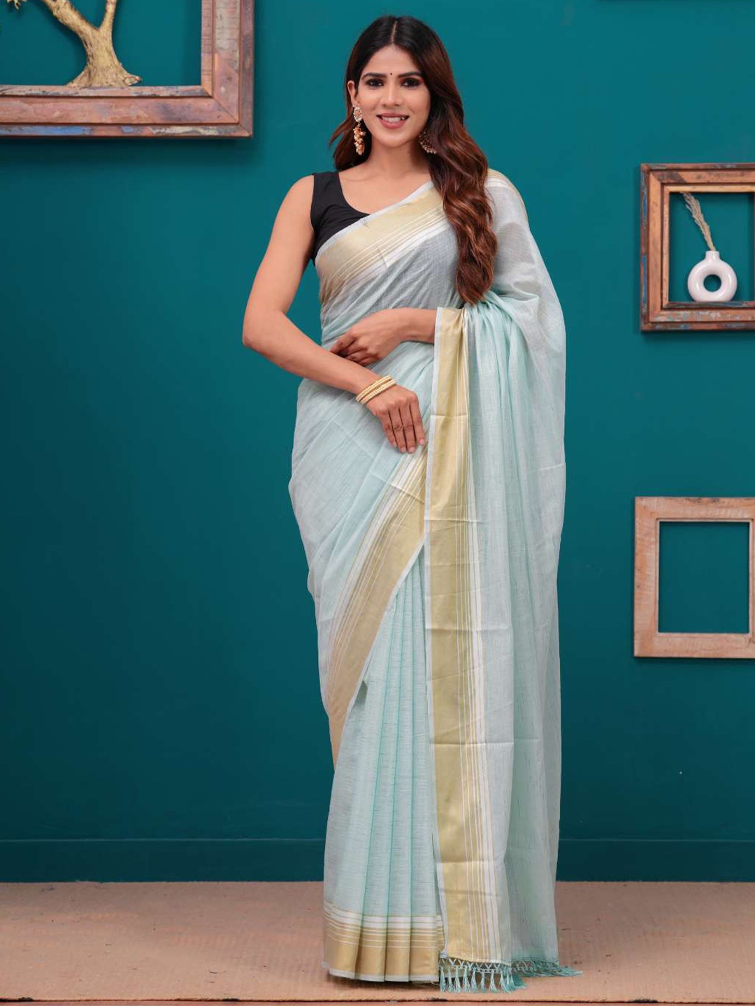 

HEARTLOOM Solid Woven Design Zari Chanderi Saree, Sea green