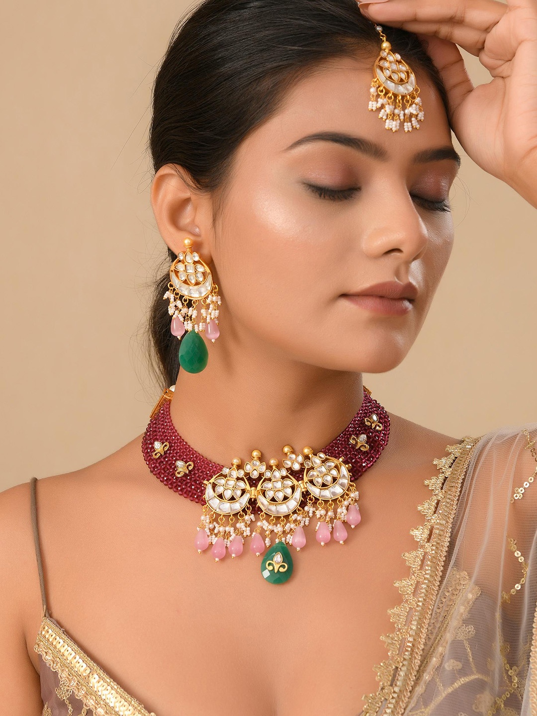 

DASTOOR Gold Plated Kundan Studded Necklace & Earrings With Maang Tika, Red