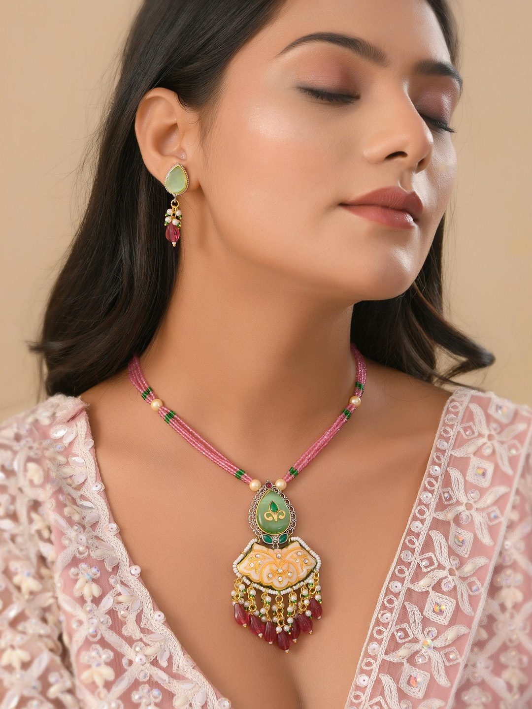 

DASTOOR Gold Plated Kundan Studded & Beaded Necklace & Earrings