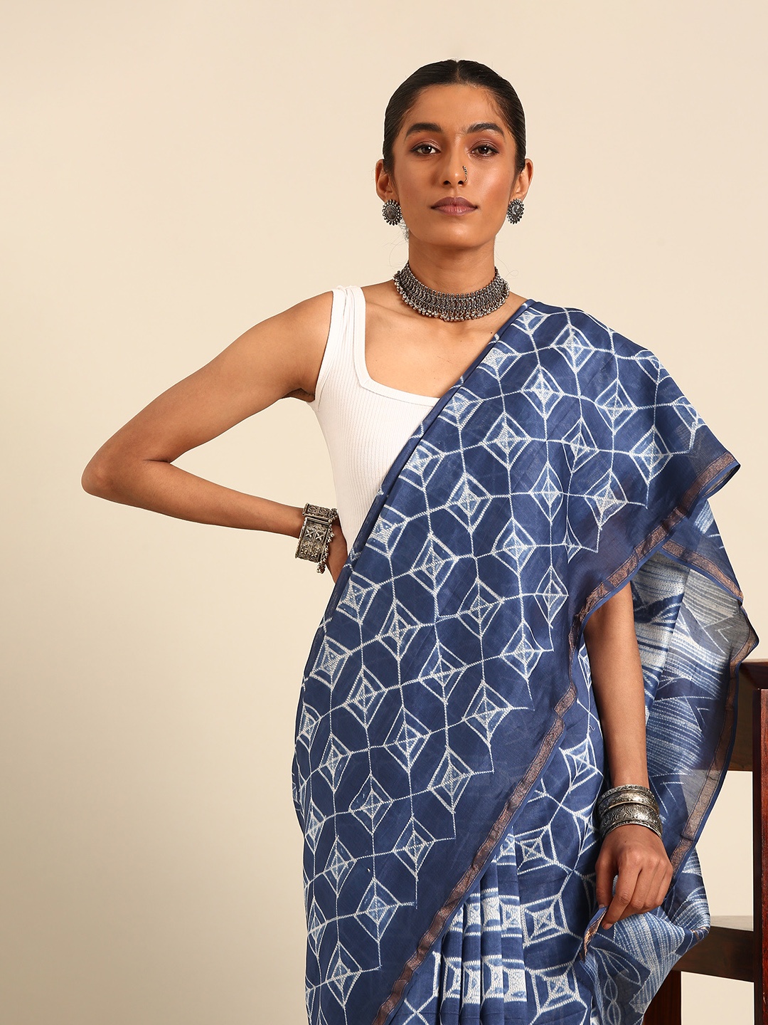 

Taavi Shibori Style Silk Blend Chanderi Saree With Zari Highlights, Blue