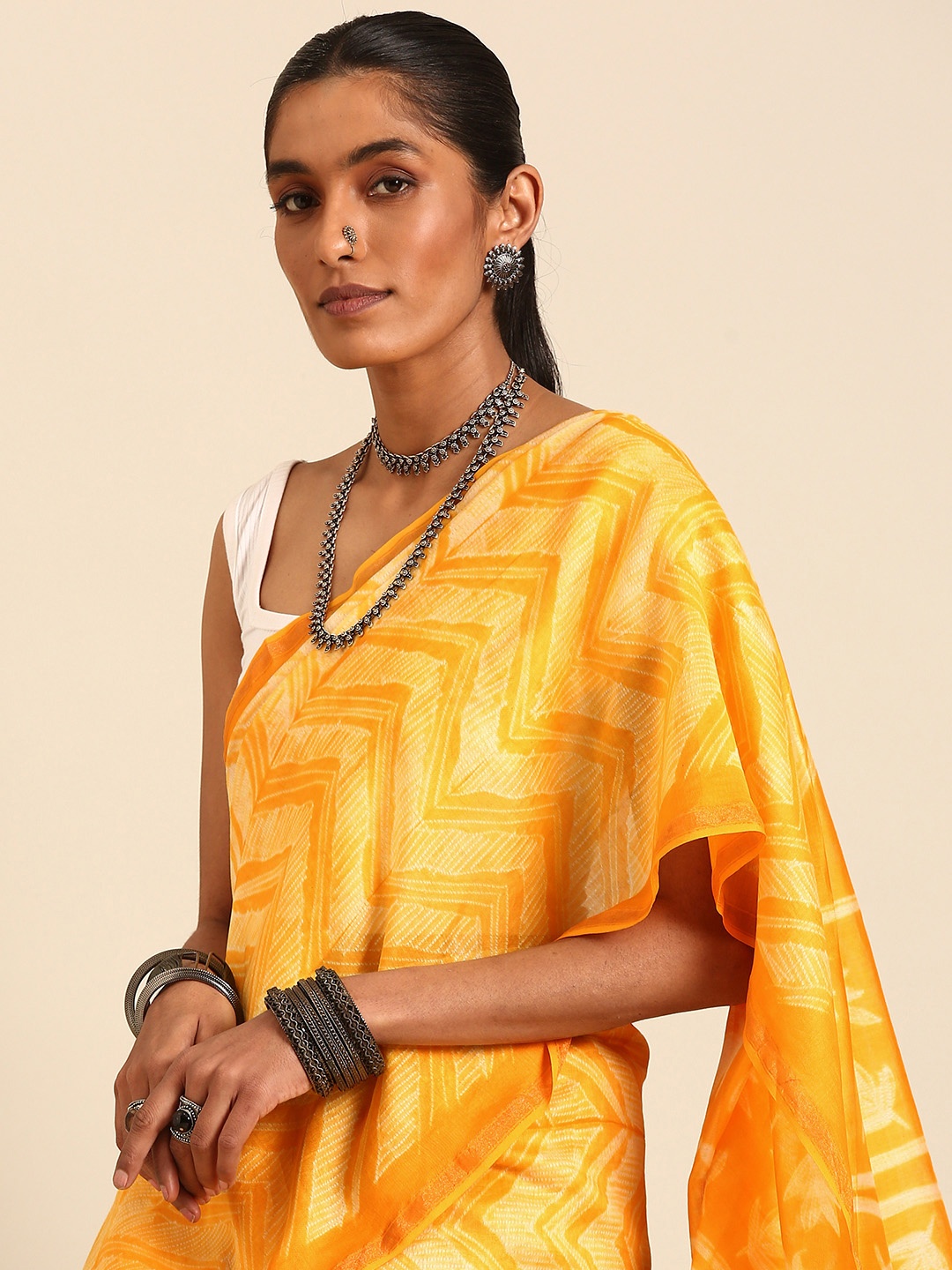 

Taavi Shibori Style Chanderi Silk Blend Zari Detail Saree, Yellow