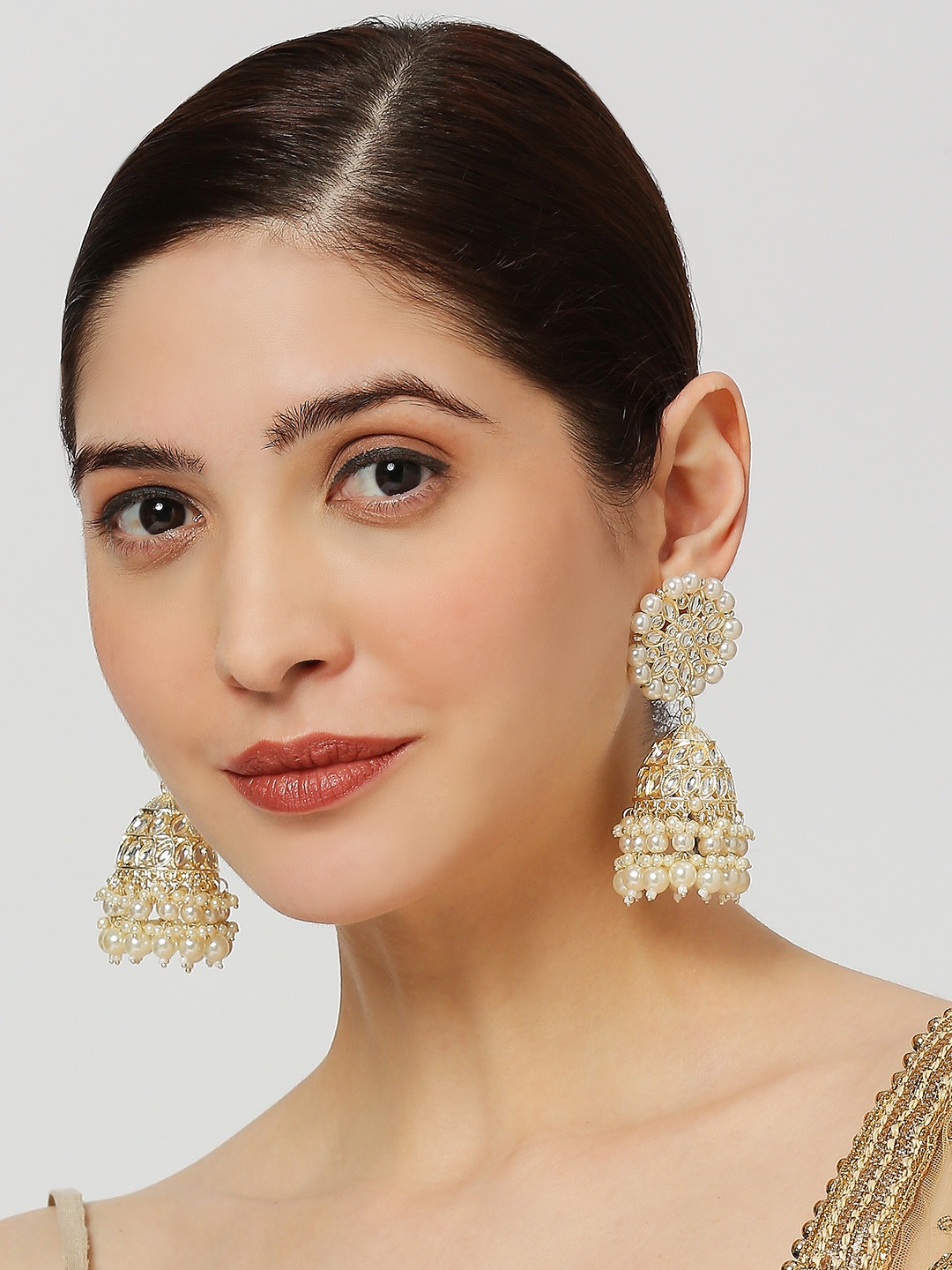 

Anouk Gold Toned Kundan & Pearls Dome Shaped Jhumkas
