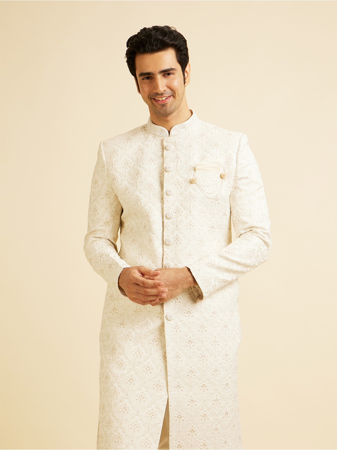 

Manyavar Men Mandarin Collar Embroidered & Stone Work Sherwani Set, Cream