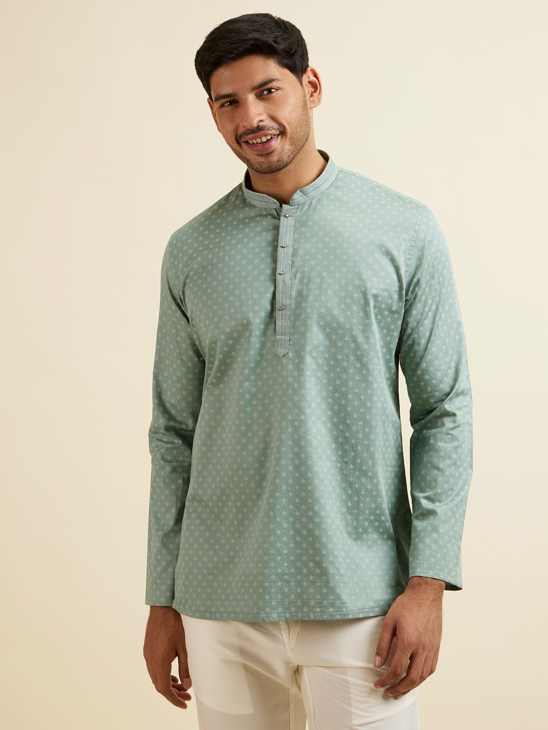 

Manyavar Floral Printed Thread Work Mandarin Collar Cotton Straight Short Kurta, Green