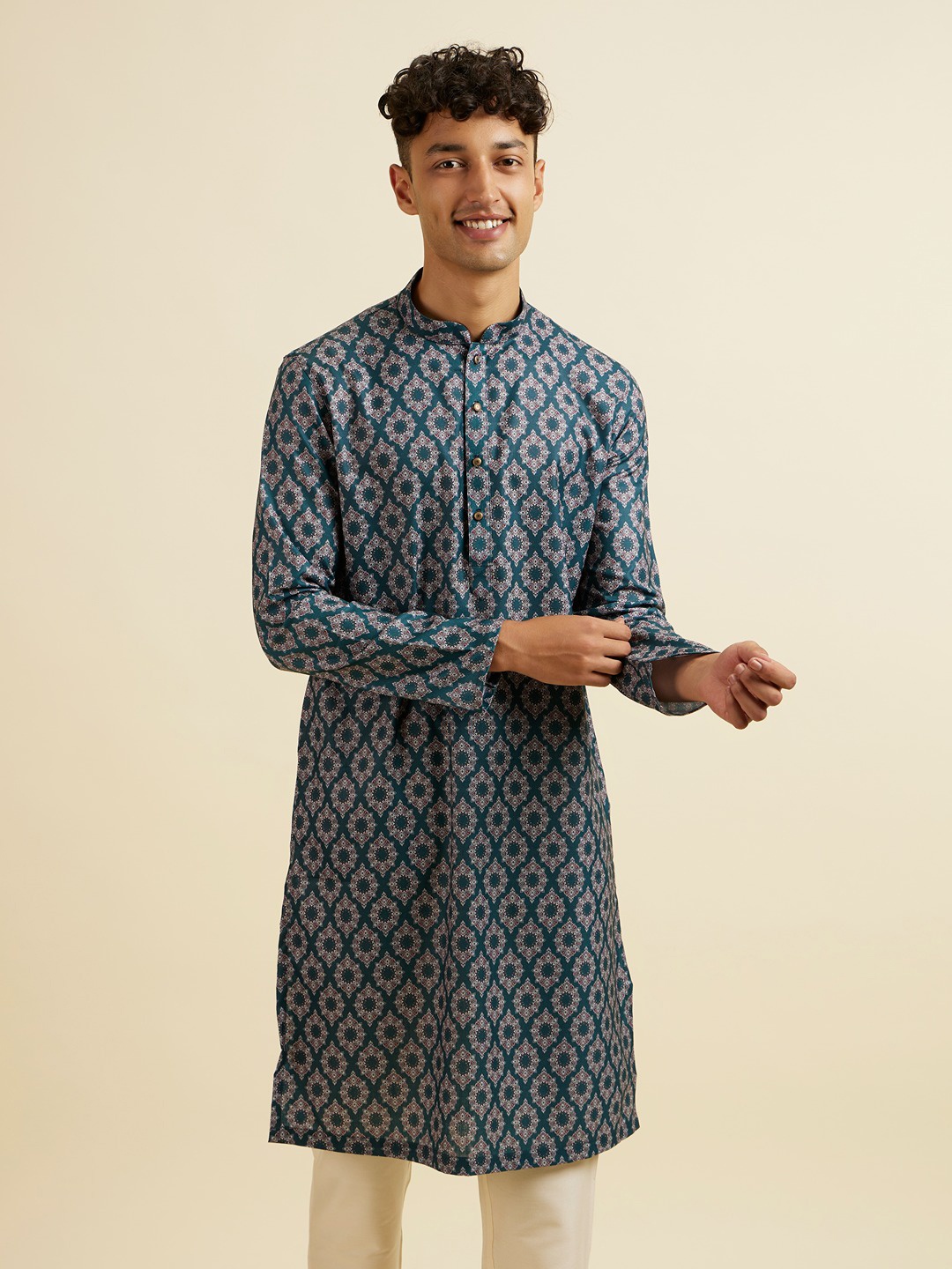 

Manyavar Ethnic Motifs Printed Mandarin Collar Straight Cotton Kurta, Teal