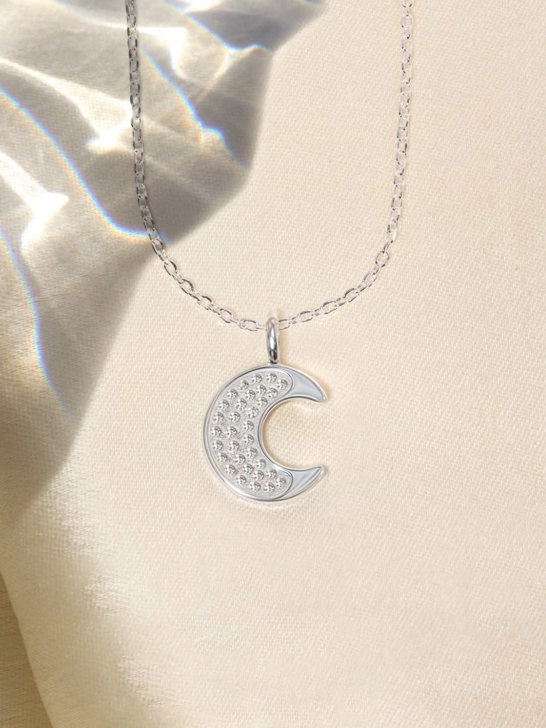 

HighSpark 925 Sterling Silver Cubic Zirconia Studded Crescent Shaped Pendant with Chain