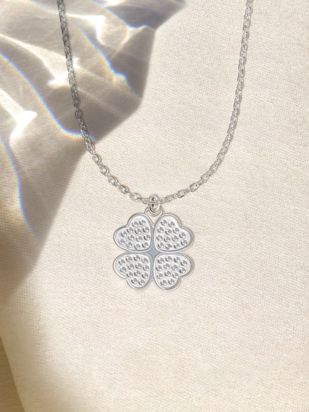 

HighSpark 925 Sterling Silver Cubic Zirconia Studded Clover Pendant with Chain