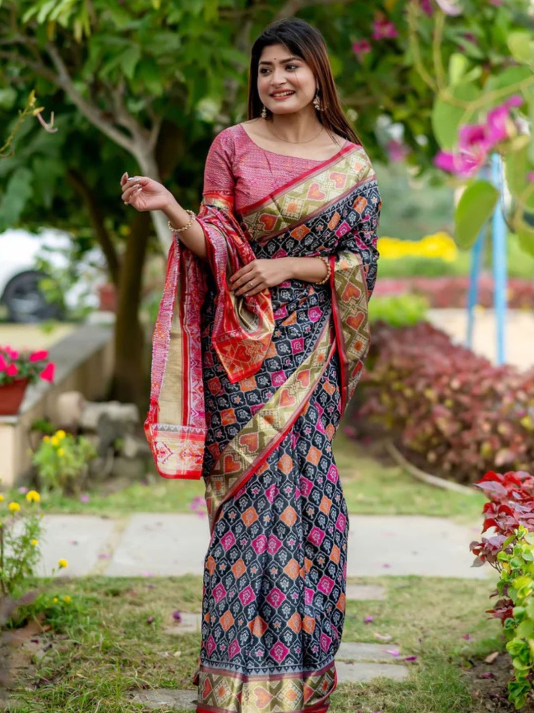 

KALINI Ethnic Motifs Woven Design Zari Patola Saree, Black