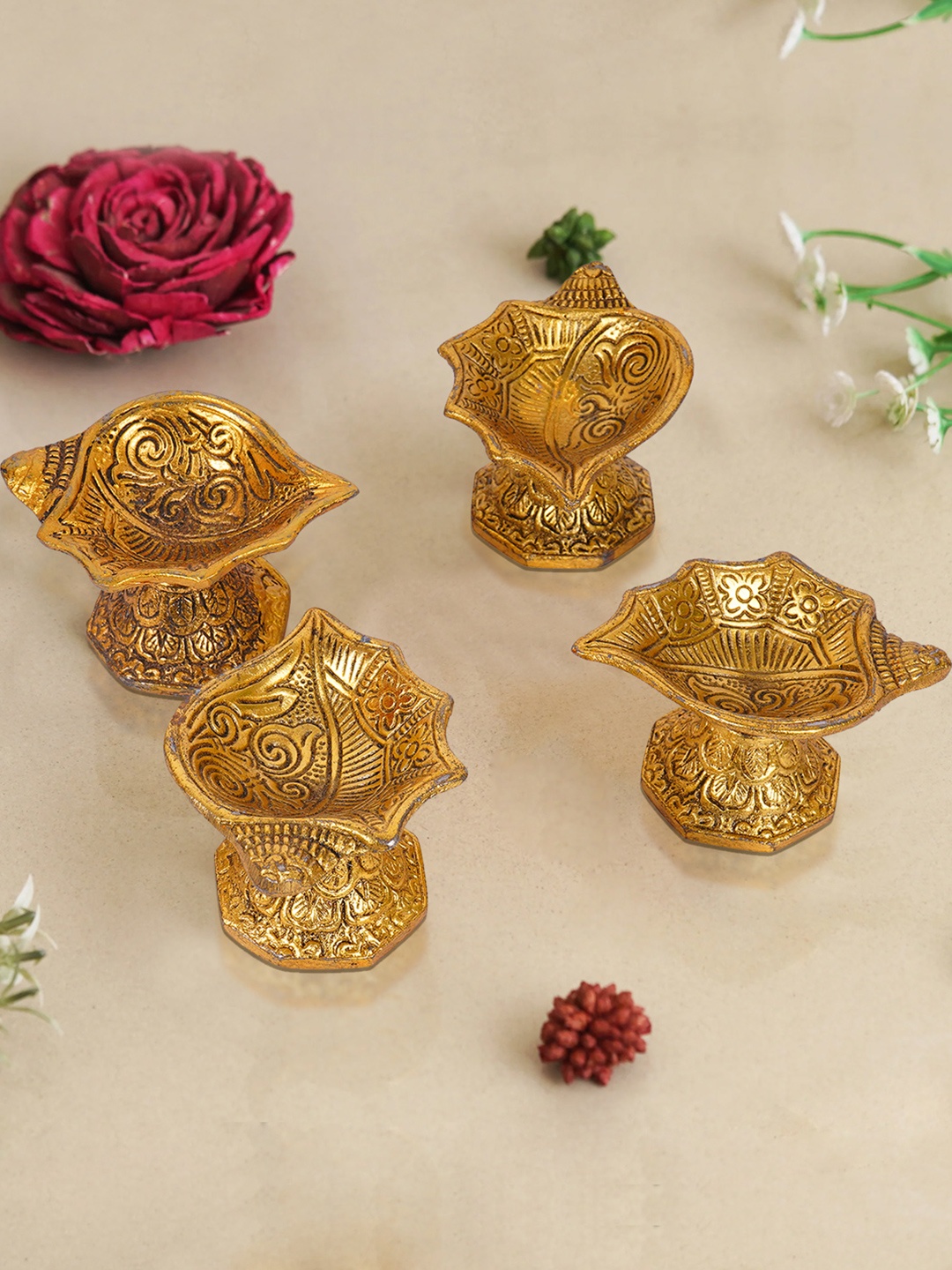 

TIED RIBBONS Gold Toned 4 Pieces Textured Metal Pooja Diyas