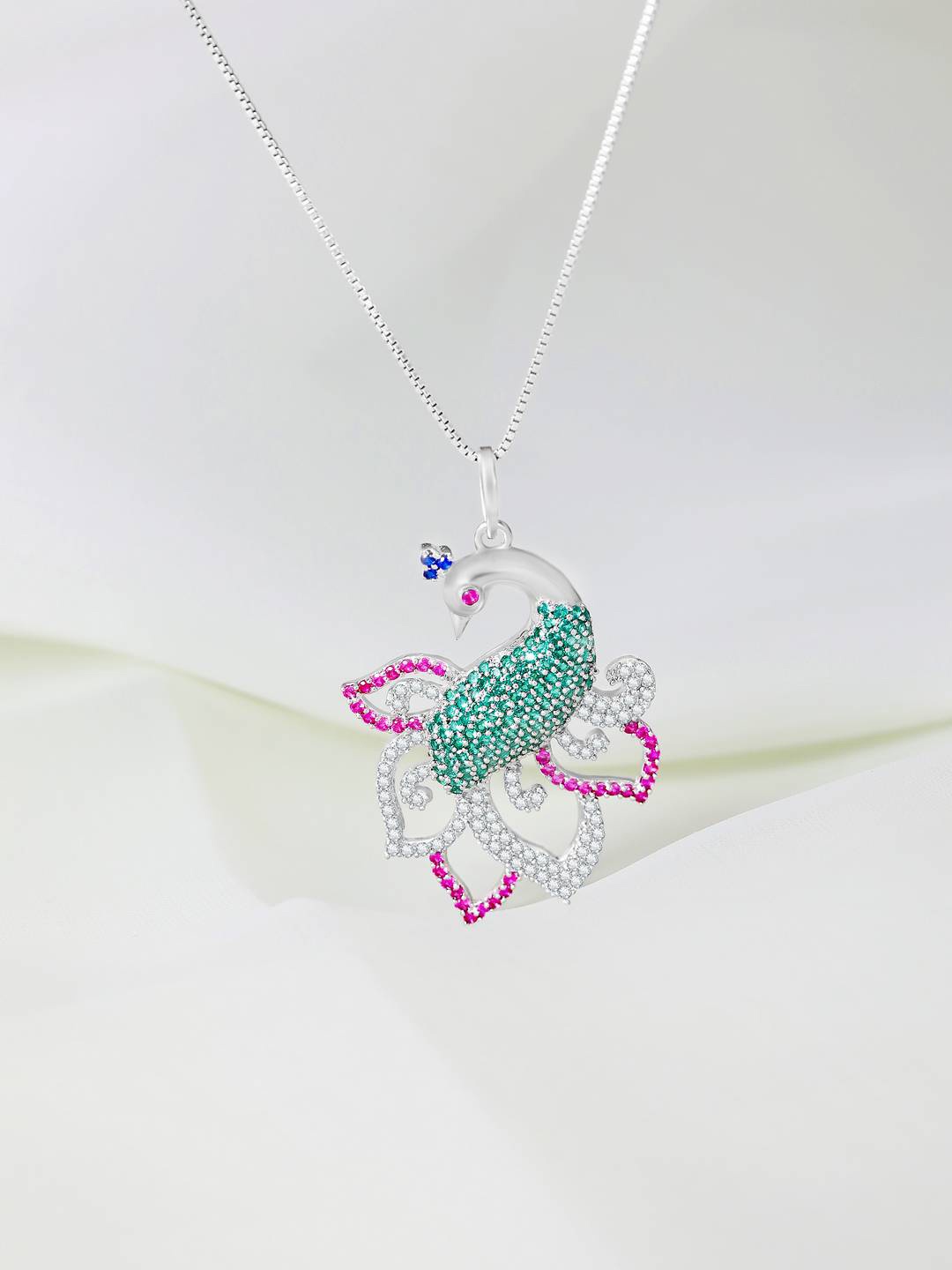 

Zavya 925 Sterling Silver Rhodium-Plated CZ Studded Peacock Shaped Pendant with Chain