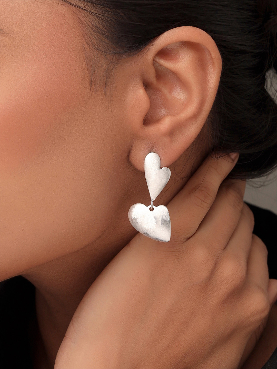 

Kicky And Perky Rhodium Plated 92.5 Sterling Silver Heart Shaped Drop Earrings