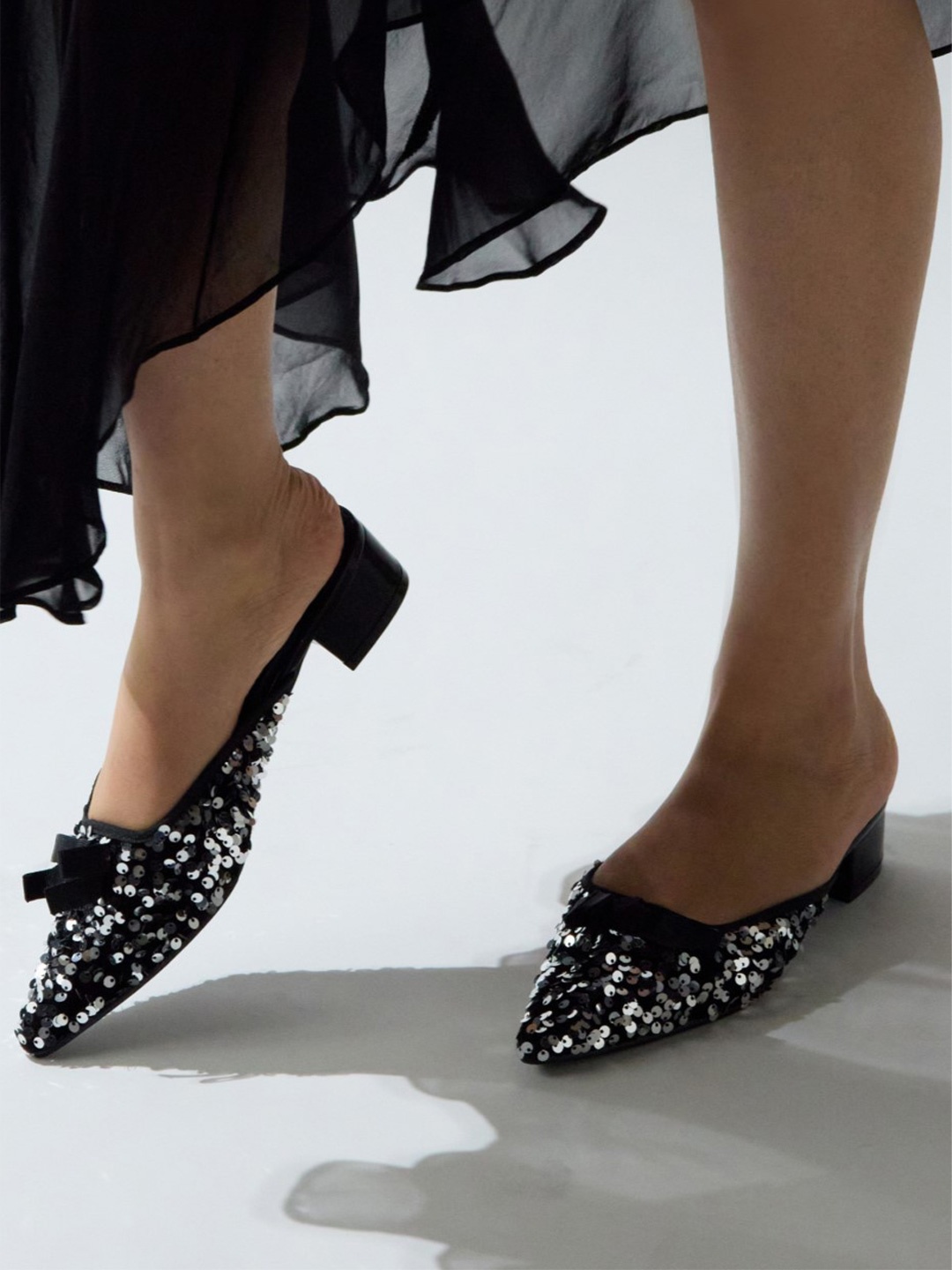 

CAI Sequence Bow Mules, Black