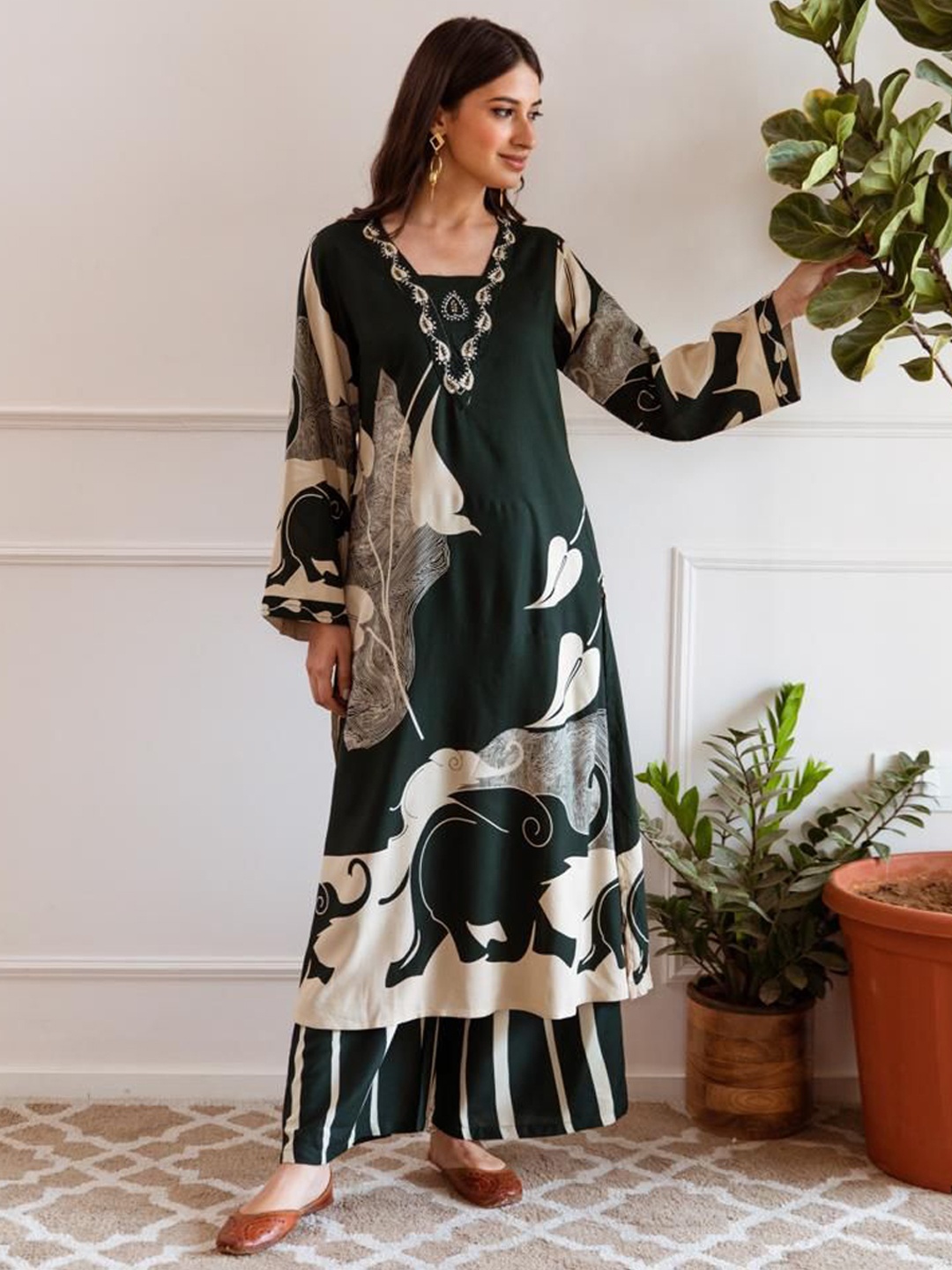 

Indo Era Women Printed Regular Beads and Stones Kurta with Palazzos, Green