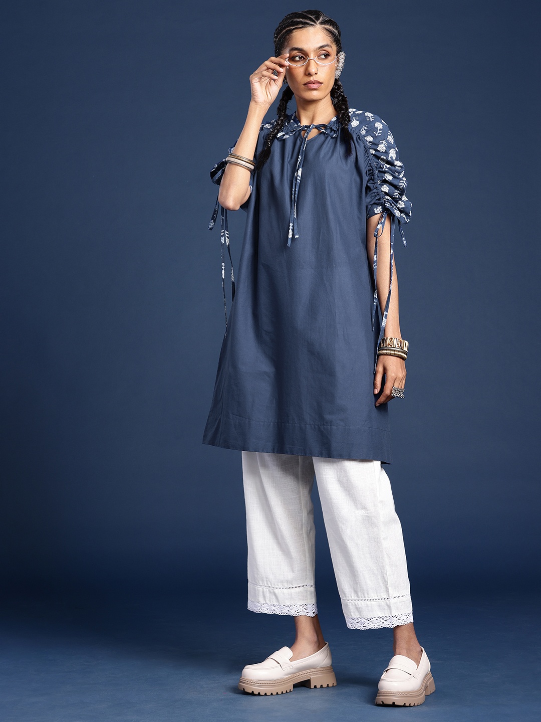 

Taavi Dabu Printed Detailed Raglan Sleeves Tie- Up Neck Pure Cotton Kurta, Blue