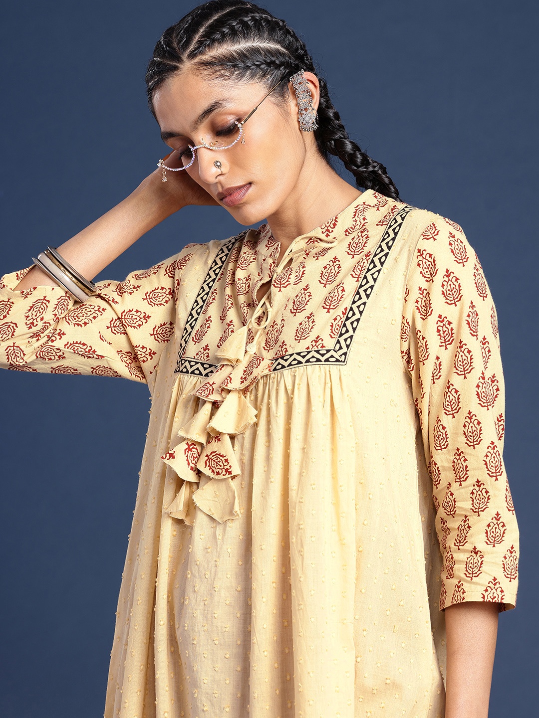 

Taavi Bagru Ethnic Motifs Printed Yoke Design Tie-Up Neck Dobby Pure Cotton A-Line Kurta, Cream
