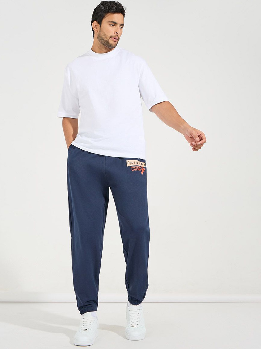 

Styli Men Friends Graphic Printed Pure Cotton Oversized Terry Joggers, Navy blue